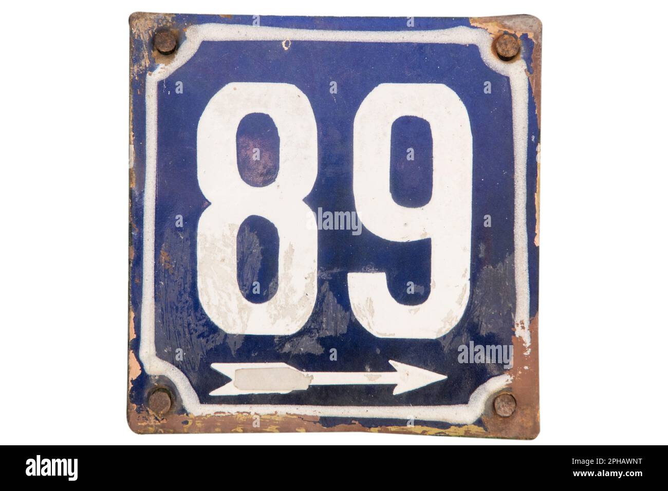 Weathered grunge square metal enameled plate of number of street address with number 89 isolated on white background Stock Photo