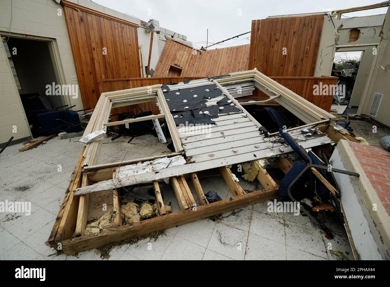 A blown down wall and ripped off roof open a main room to the Rolling