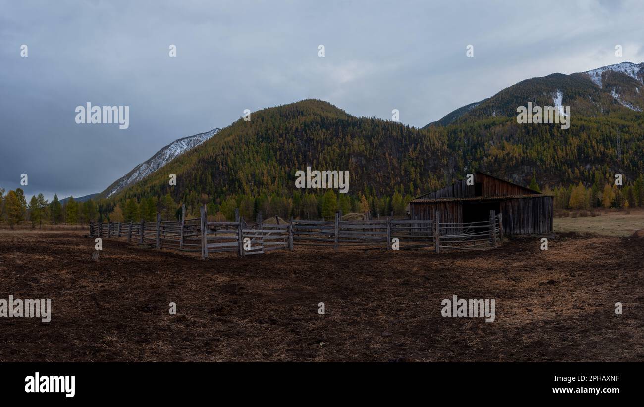 Corral with a barn for animals and hay in the mountains in the Altai in Siberia Stock Photo