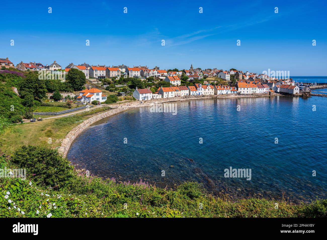 View looking down on the colourful houses on the Fife Coastal Path as