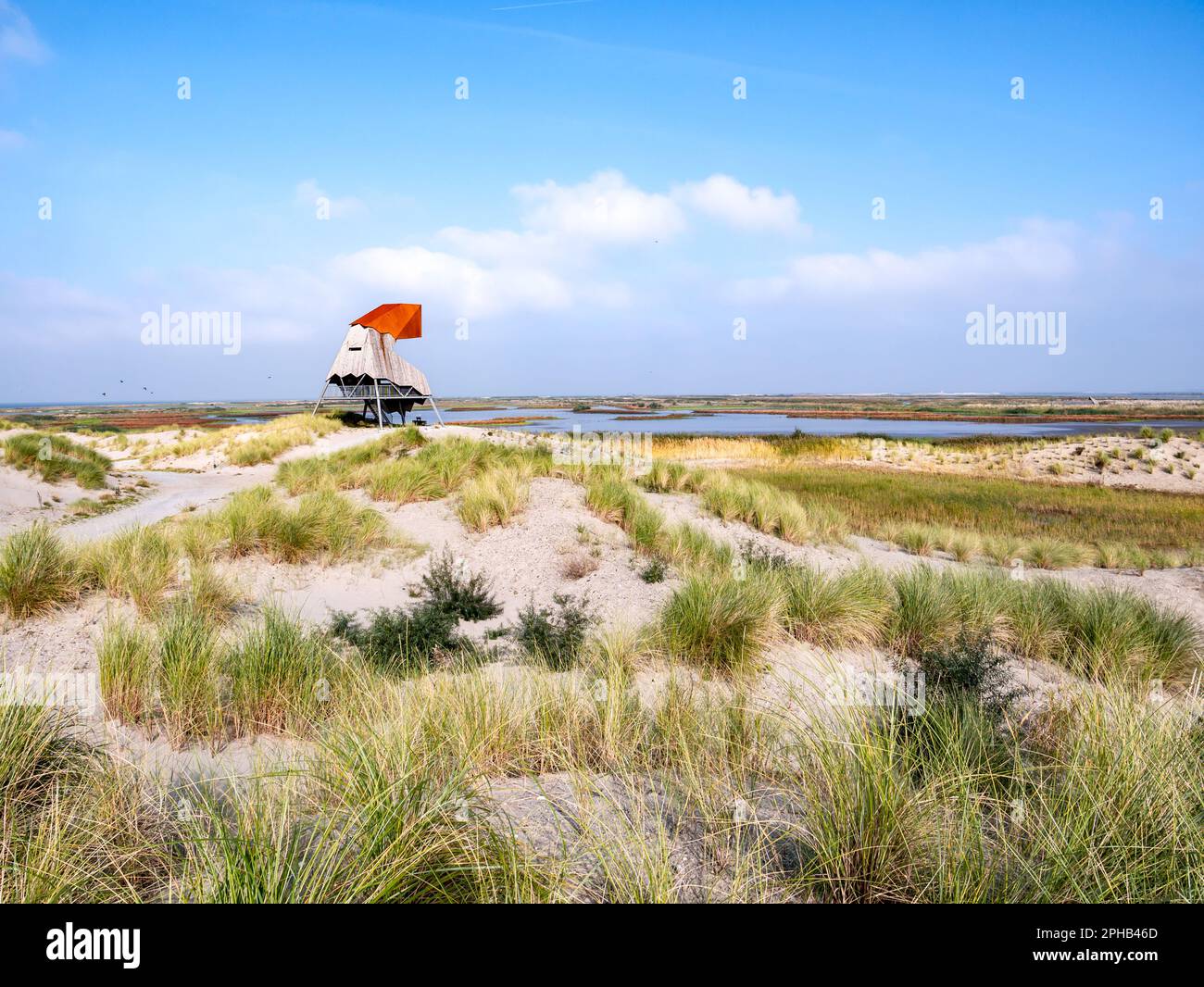 Watch tower in sand dunes and marshland on Marker Wadden island in Markermeer, Netherlands Stock Photo