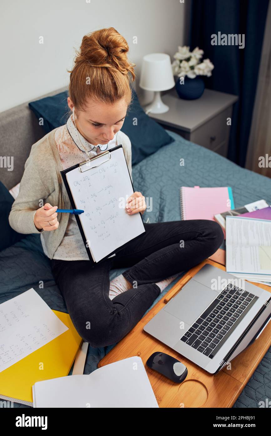 Young woman student having classes, learning online, watching lesson ...