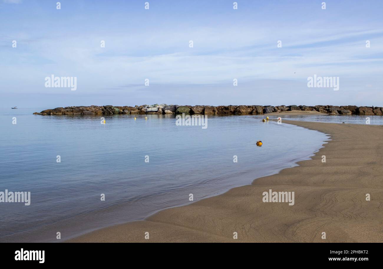 Landscape panorama of the sand dune system on the beach. Wide beach in Calabria, southern Italy. Stock Photo