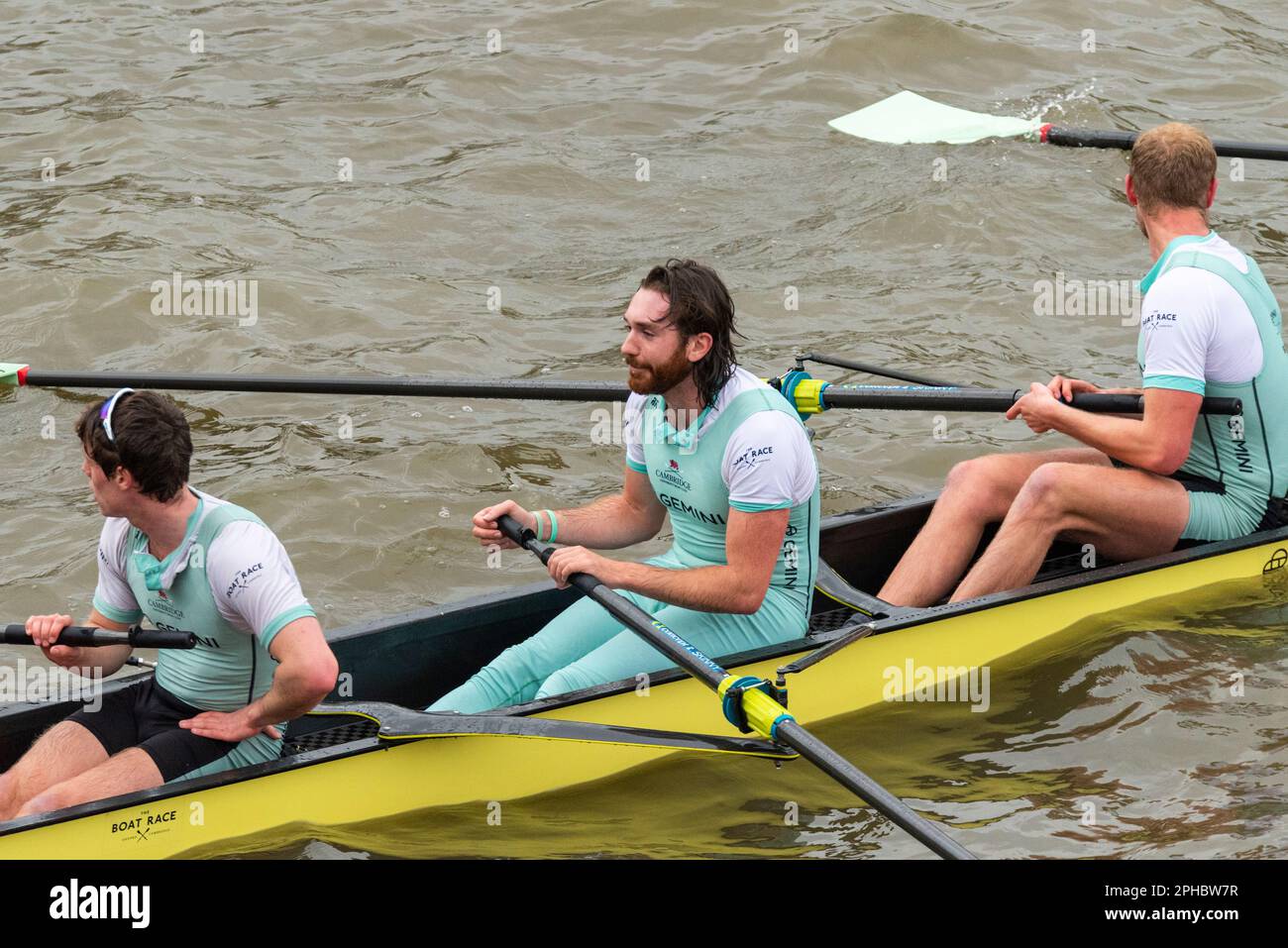 Boat Race 2023. Cambridge rowers after crossing the finish line at
