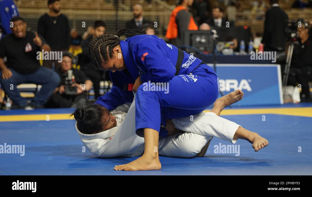 ORLANDO, FLORIDA - MARCH 26: Gabreili Pessanha De Souza Marinho (Infight JJ) def. Mayara Monteiro Custodio (Checkmat) via ankle lock (6:21) during IBJJF PAN AMS 2023 Finals at Osceola Heritage Park. (Photo by Marcelo Woo/PxImages) Stock Photo