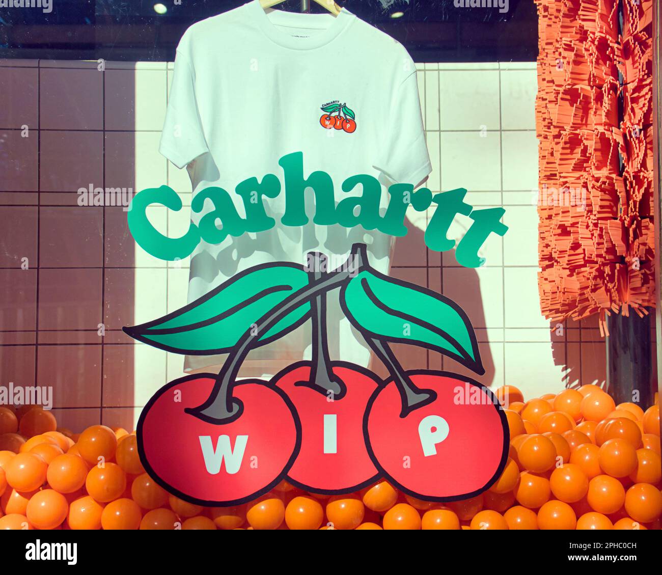 Carhartt cotton t shirt in shop window display with logo Stock Photo