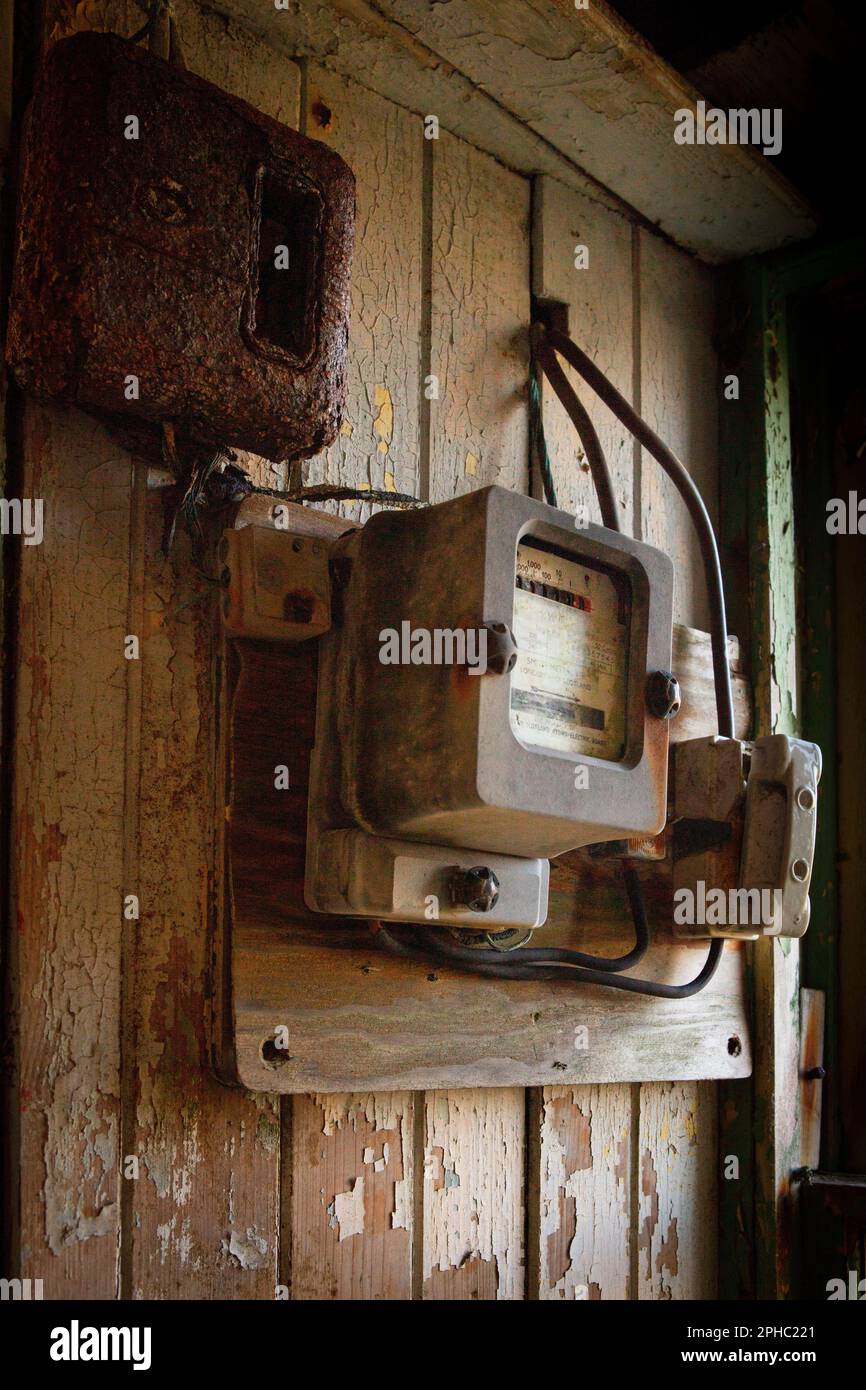 Old electric meter in abandoned house Stock Photo Alamy