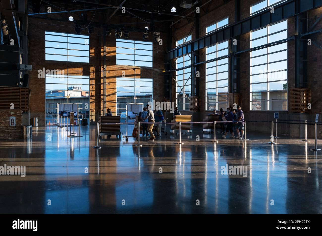 Interior of the Rocky Mountaineer train station with people tourists at check in, Vancouver, Canada. Stock Photo