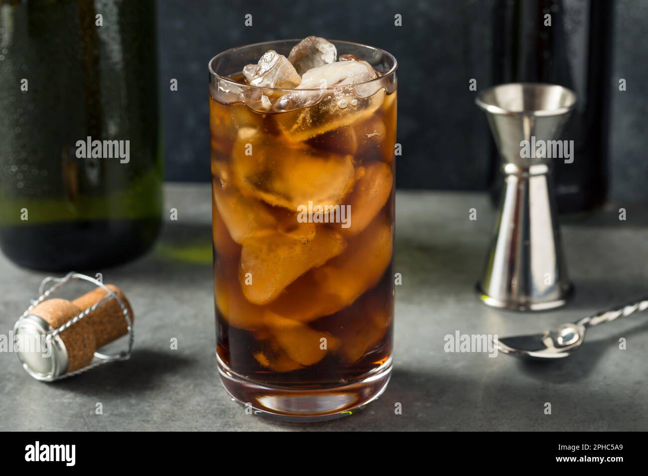 Cold Refreshing Boozy Diet Cola and Champagne with Ice in a Glass Stock Photo