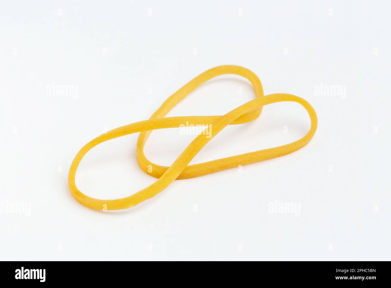 Yellow Rubber Bands Close Up With Hand Isolated On White Background Stock  Photo - Download Image Now - iStock