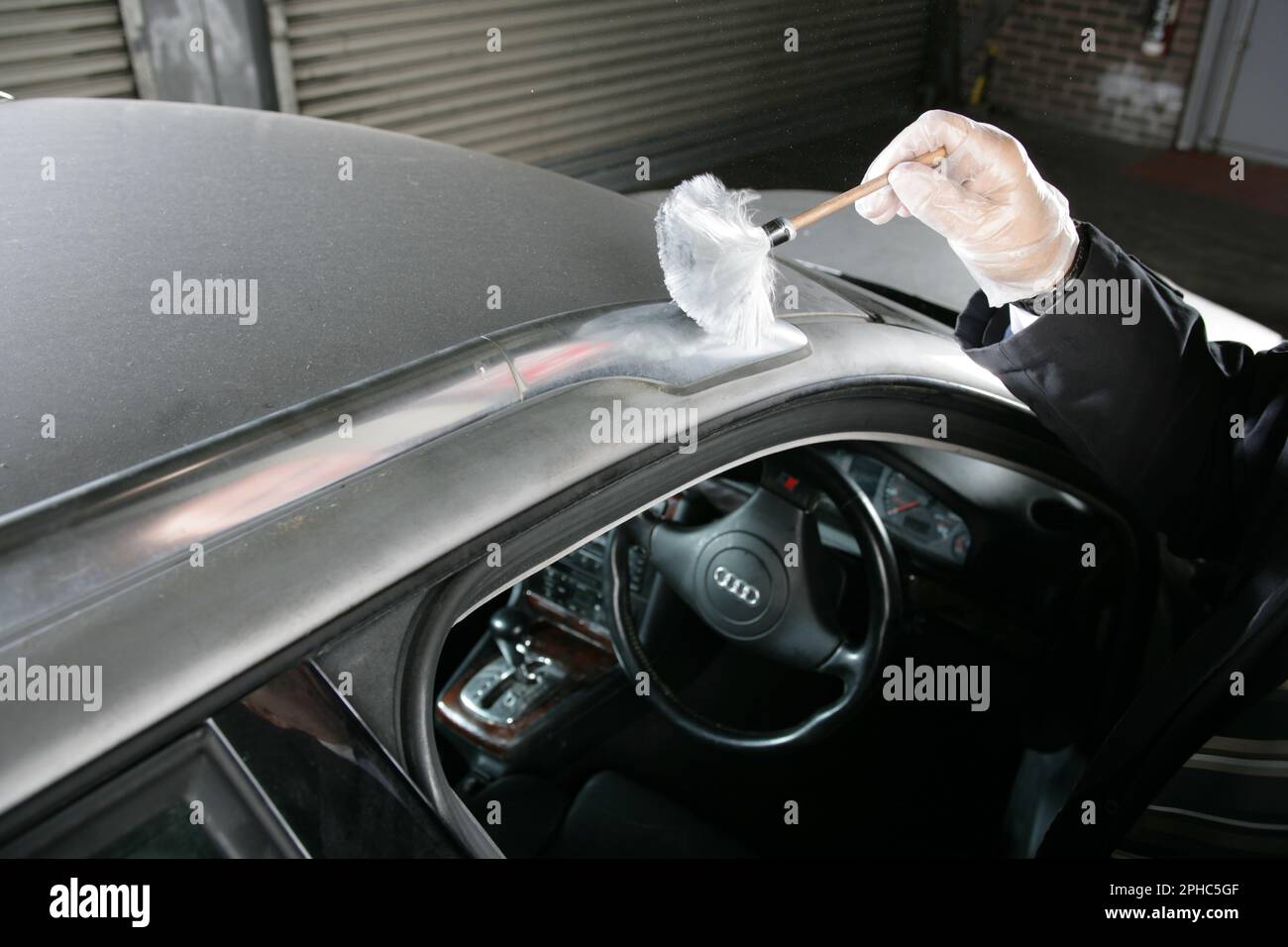 Dusting for fingerprints on a car Stock Photo Alamy