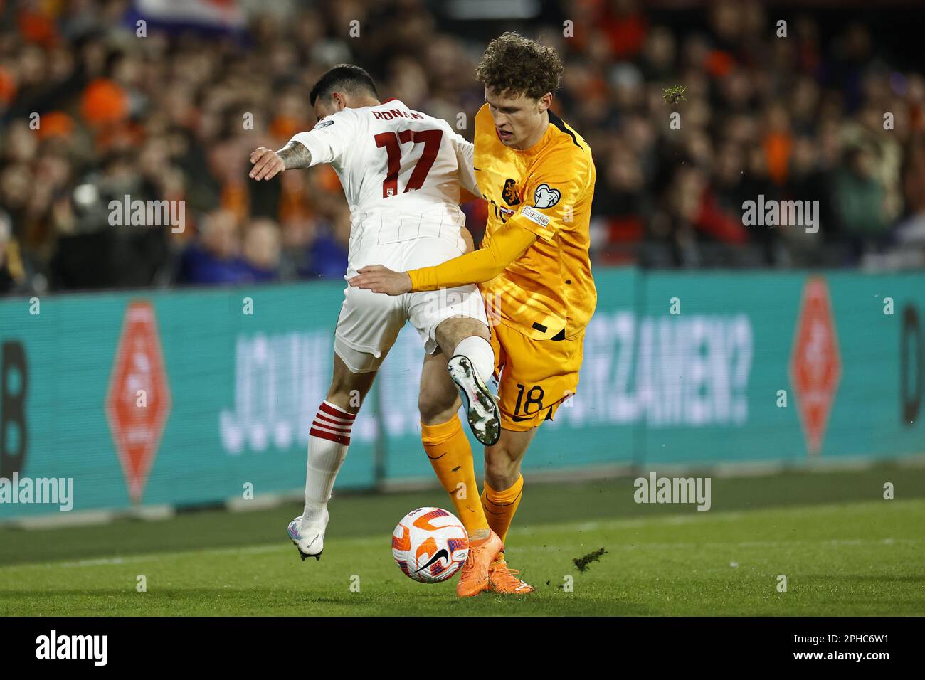 Rotterdam, Netherlands. 27th Mar, 2023. ROTTERDAM - (lr) Kian Ronan of Gibraltar, Mats Wieffer of Holland during the UEFA European Championship Qualifying match between the Netherlands and Gibraltar at Feyenoord Stadion de Kuip on March 27, 2023 in Rotterdam, Netherlands. ANP MAURICE VAN STONE Credit: ANP/Alamy Live News Credit: ANP/Alamy Live News Stock Photo