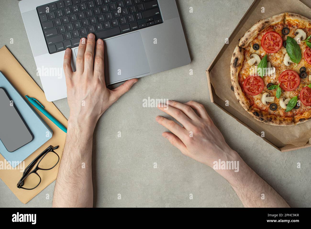 Office eating pizza slice desk hi-res stock photography and images - Alamy