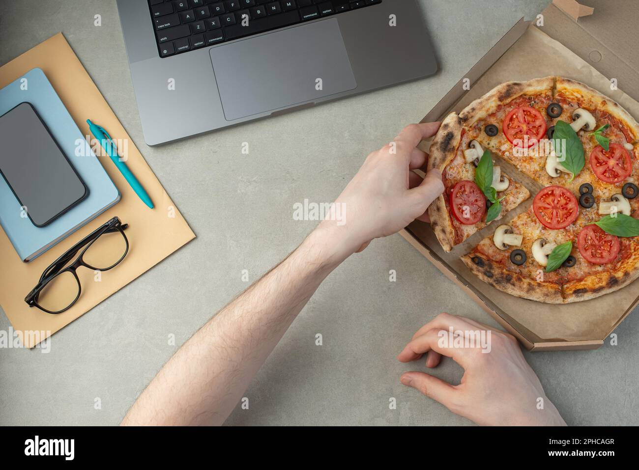 Office eating pizza slice desk hi-res stock photography and images - Alamy