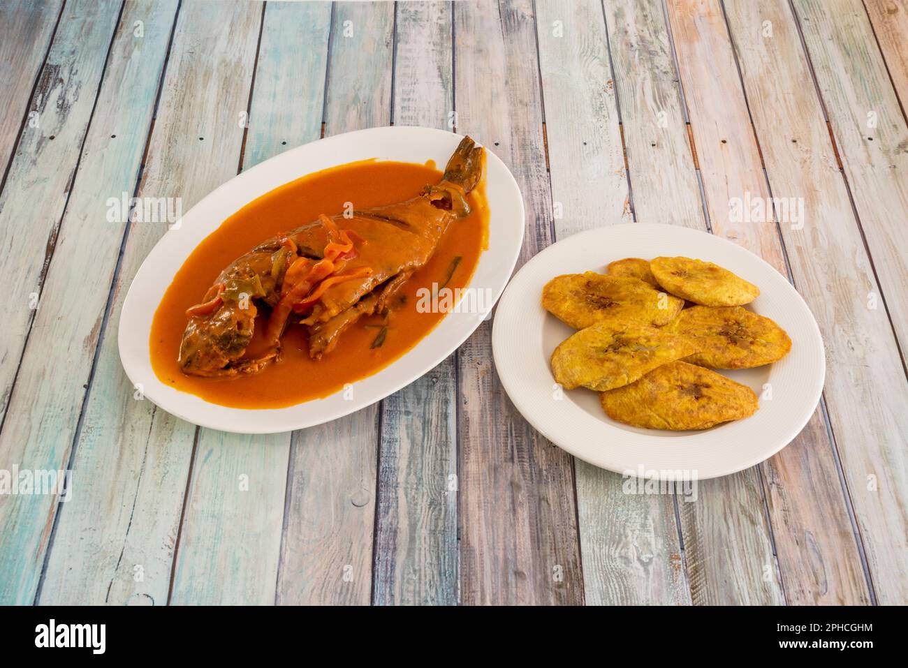It is a fish stew made with onion, chili, tomato, coriander leaves and