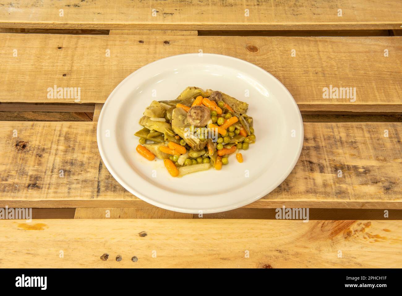 Menestra is a typical Spanish stew made with a variety of vegetables, generally those available in the garden during the season Stock Photo