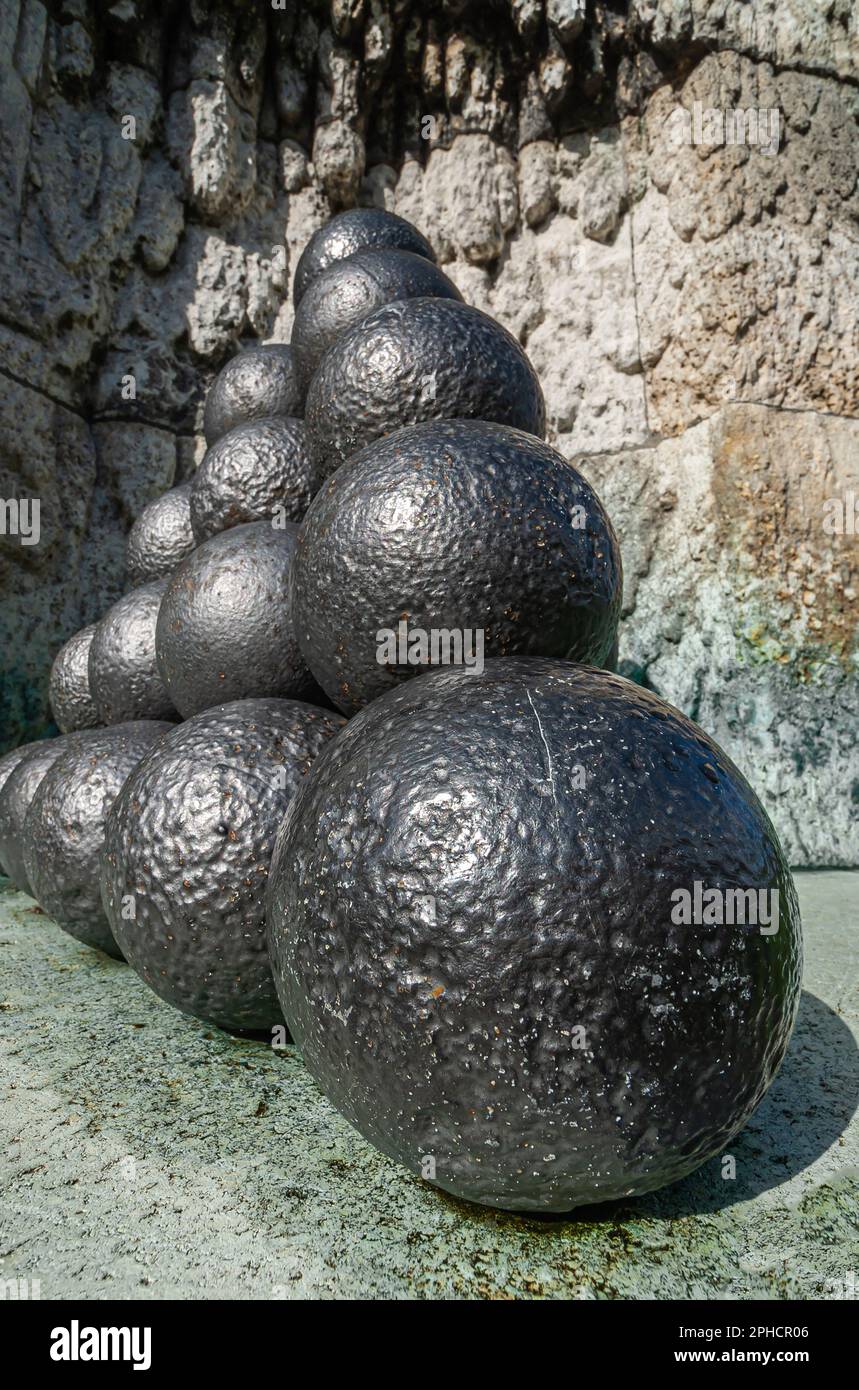 Copenhagen, Denmark - September 13, 2010: Pile of black cannon balls closeup at Admiral Ivar Huitfeldt Column Stock Photo