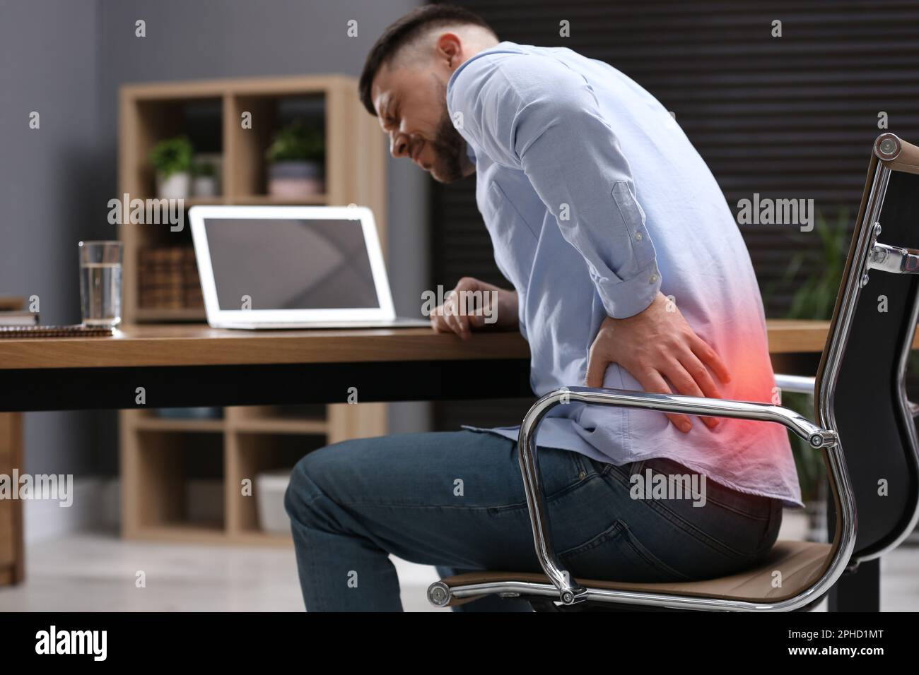 Correct posture sitting with laptop hi res stock photography and