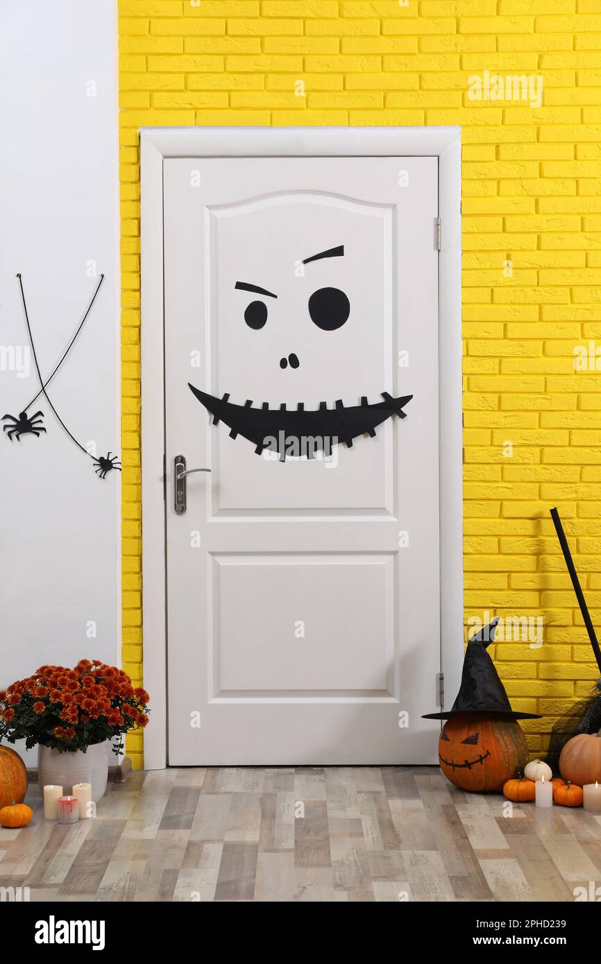 Stylish hallway interior with different Halloween decor Stock Photo Alamy