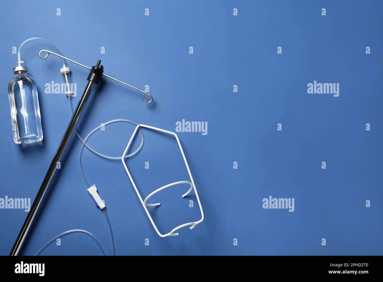 Infusion Set Background IV infusion set on blue background, flat lay. Space for text Stock ...
