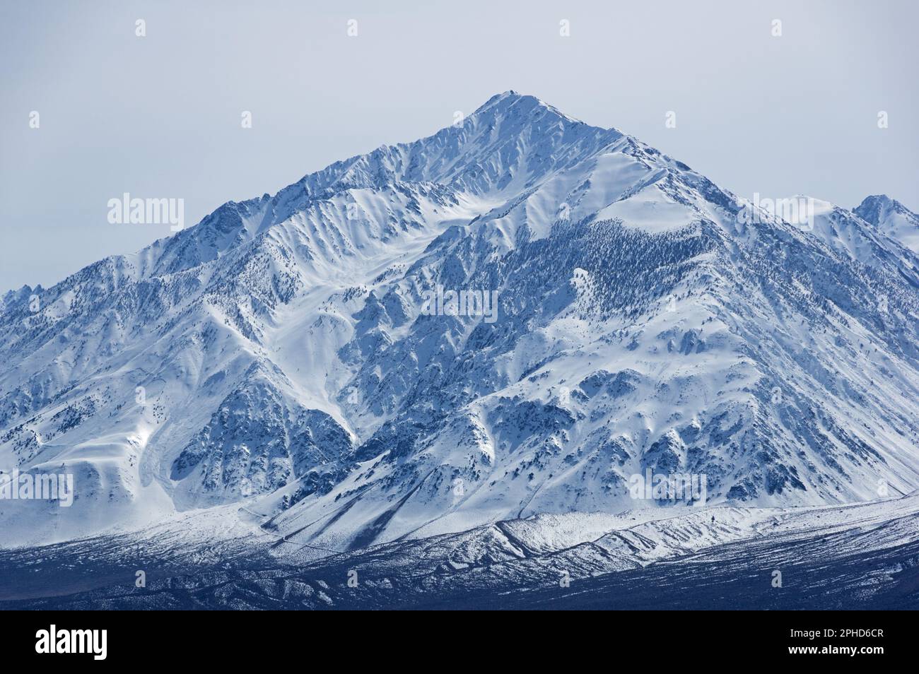 13652 foot tall Mount Tom or Winuba in the Owens Valley viewed from the north with snow in the winter Stock Photo