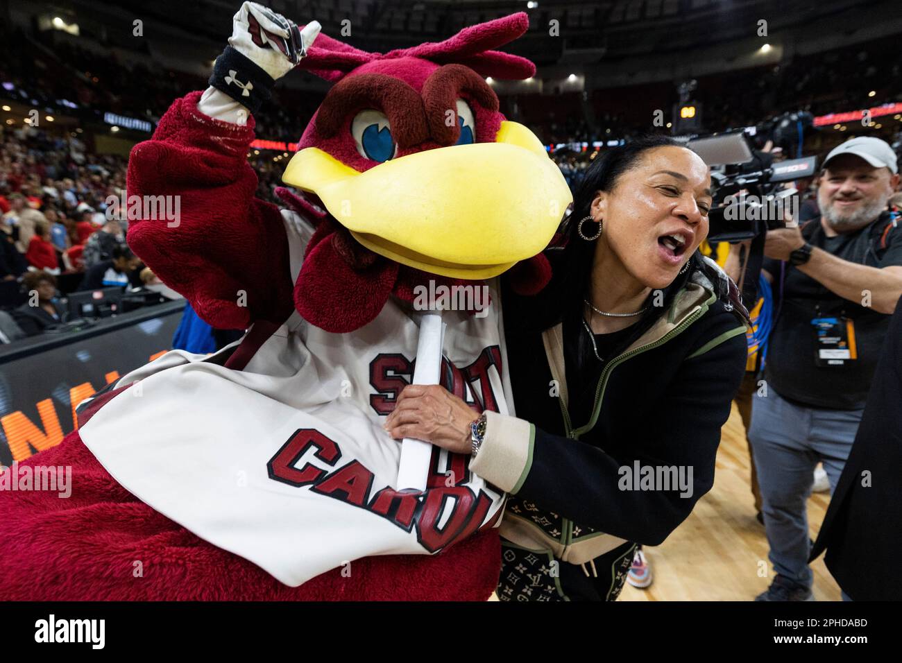 South Carolina head coach Dawn Staley celebrates with the South