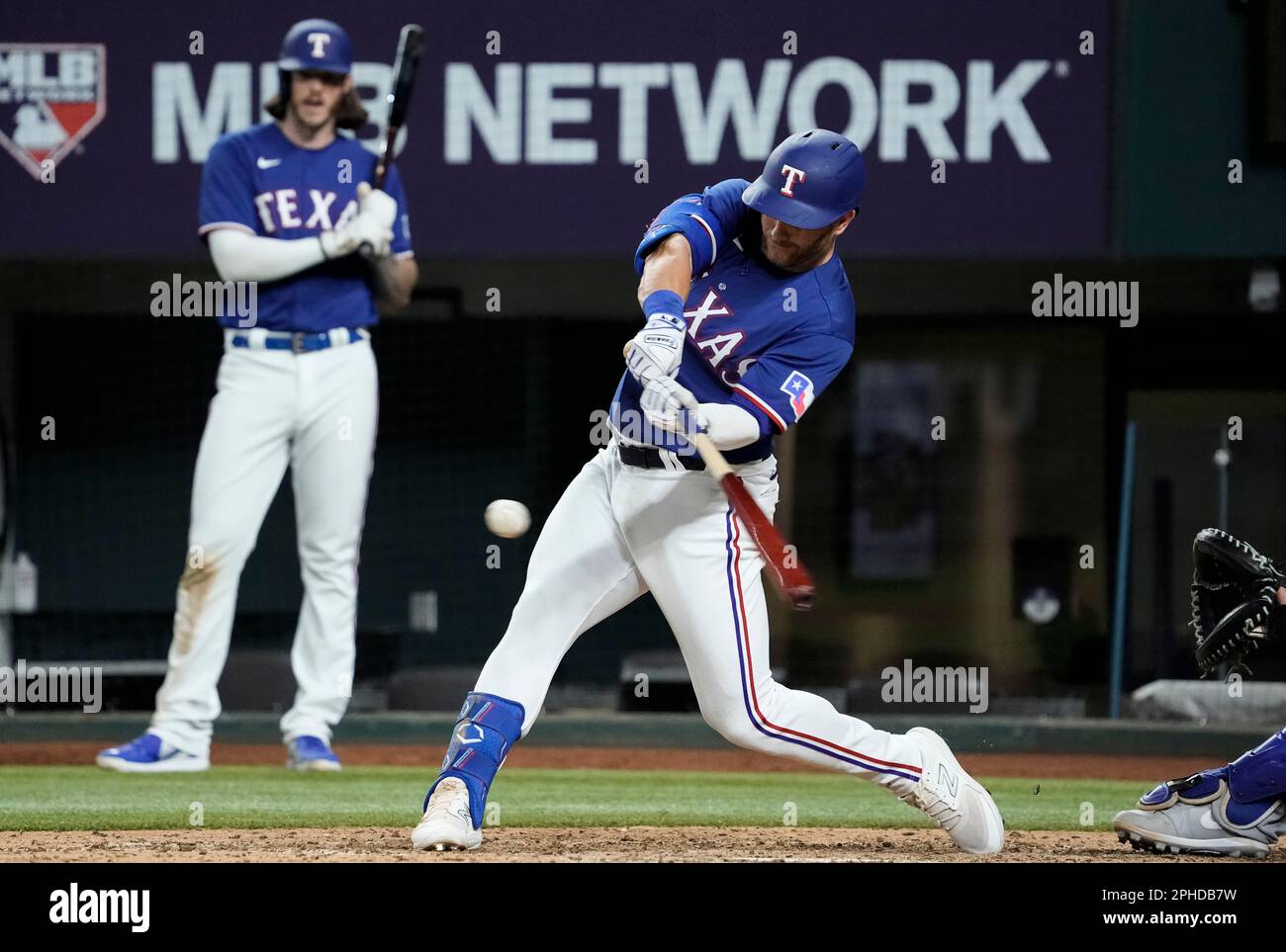 Texas Rangers' Robbie Grossman hits a single during the eighth inning ...