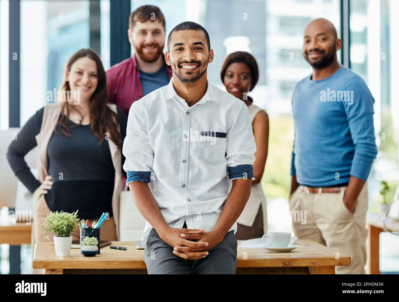 Were the team you need. Cropped portrait of a team of young designers ...