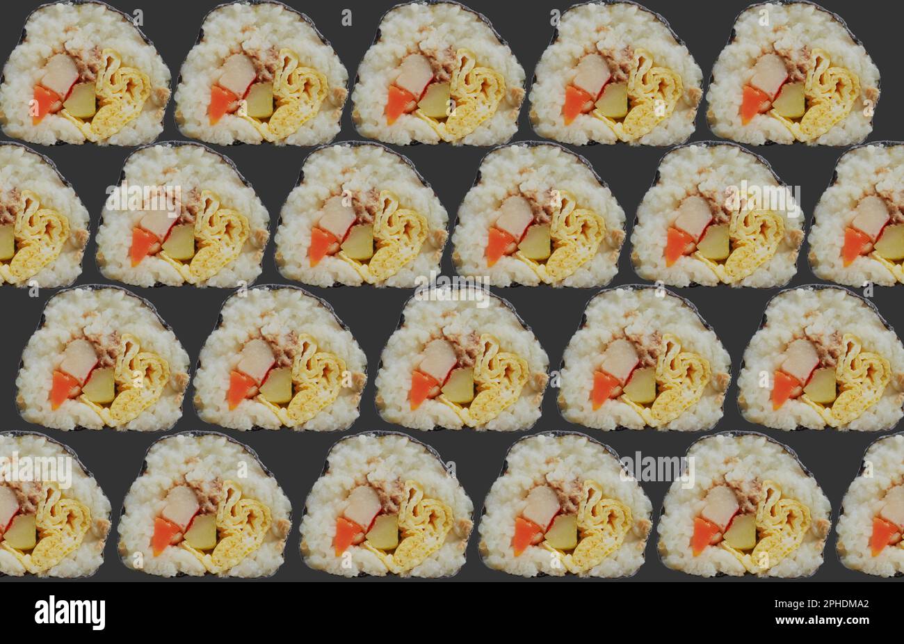 background kimbap or gimbap is Korean roll Gimbap(kimbob) made from steamed white rice (bap) and various other ingredients. Stock Photo