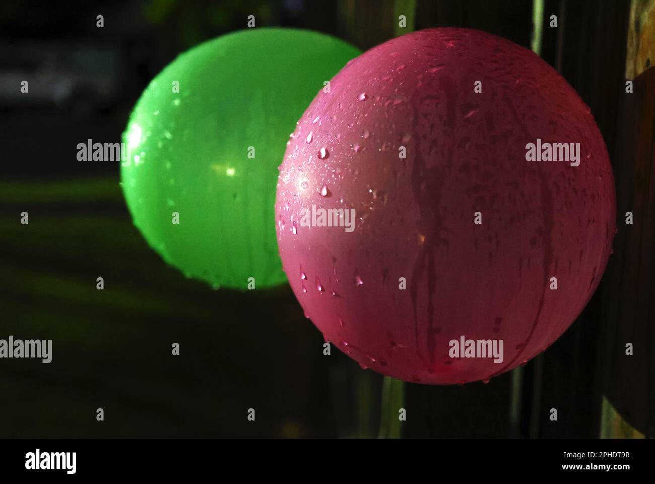 Random photo art and street photography, balloons playing in the rain