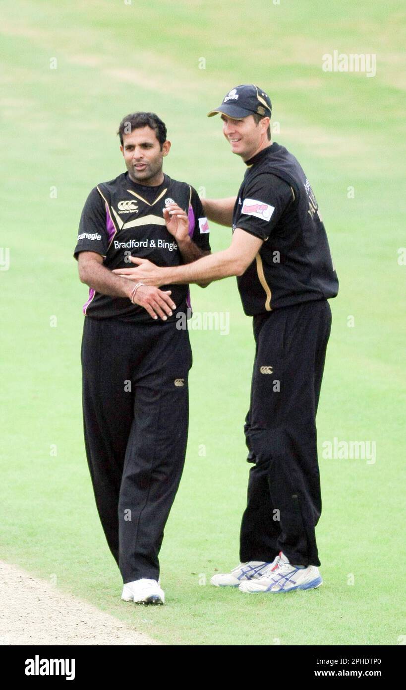 FILE PICS. PICTURE BY VAUGHN RIDLEY/SWPIX.COM - 04/06/09 - Cricket - Twenty 20 Cup - Yorkshire v Nottinghamshire - Headingley, Leeds, England - Yorkshire's Rana Naveed celebrates with Michael Vaughan after he caught and bowled Nottinghamshire's Alex Hales. Stock Photo