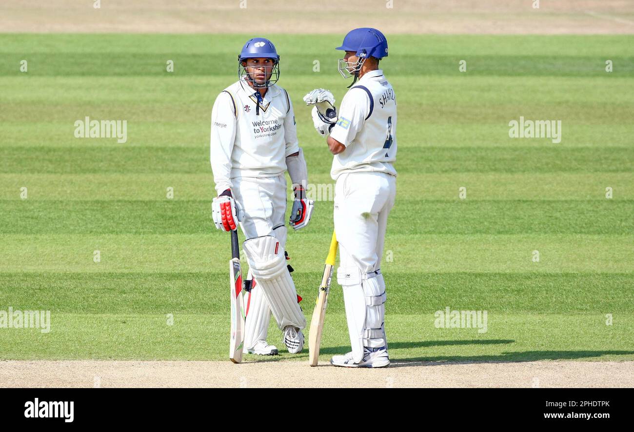 FILE PICS. PICTURE BY VAUGHN RIDLEY/SWPIX.COM - 17/04/10 - Cricket - County Championship - Yorkshire v Somerset, Day 3 - Headingley, Leeds, England - Yorkshire's Ajmal Shahzad and Adil Rashid chat during a break in play. Stock Photo