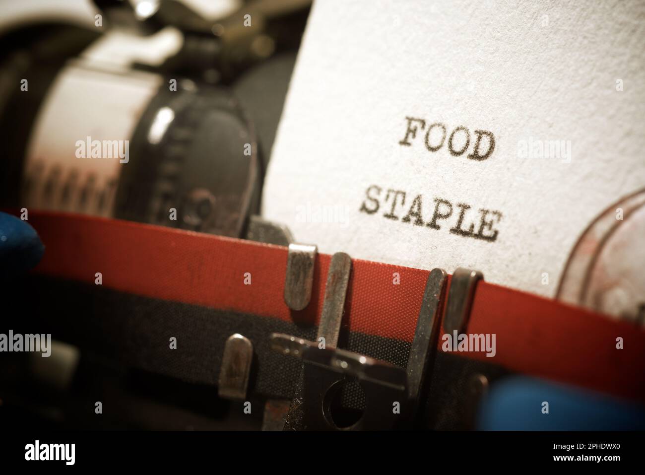 Food staple text written with a typewriter Stock Photo - Alamy