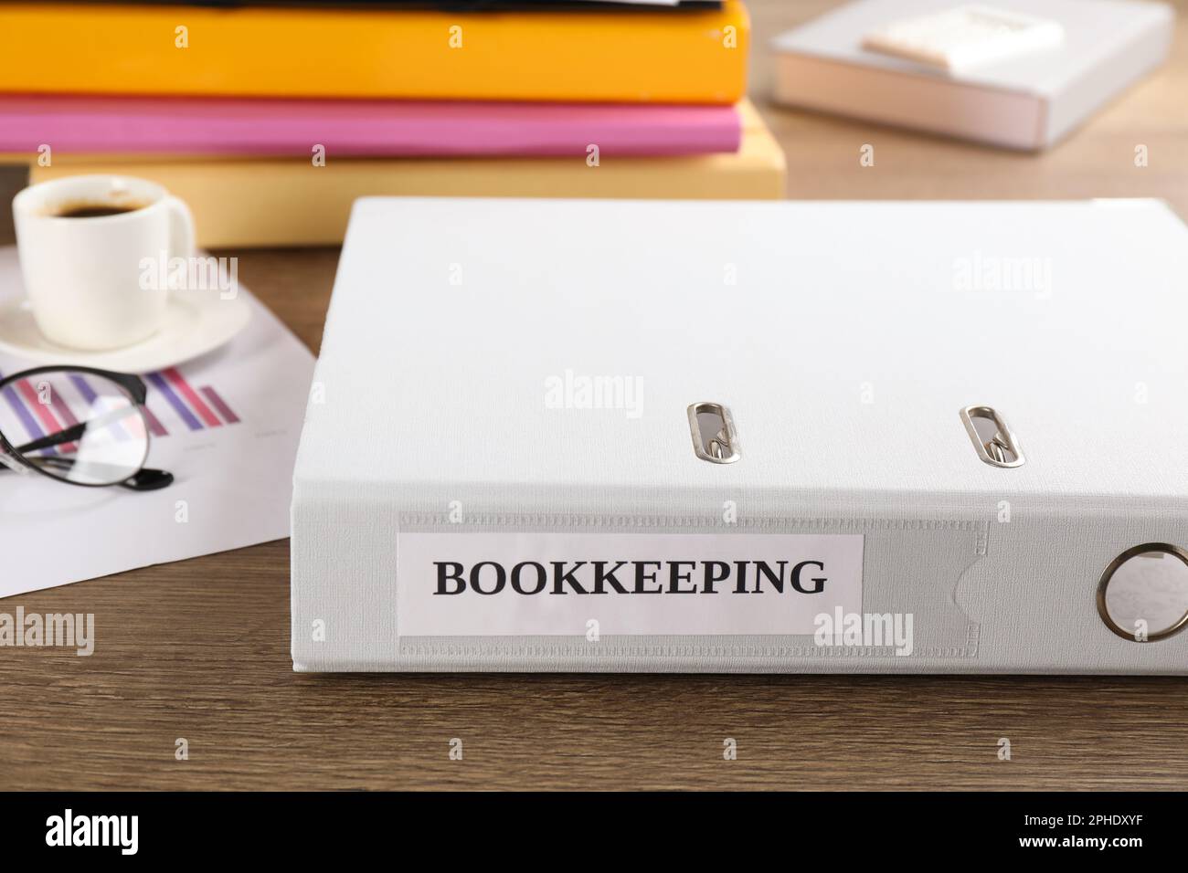 Bookkeeping folder on desk in office, closeup Stock Photo Alamy