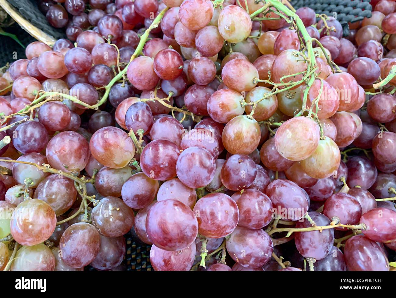 A pile of fresh red grapes in the supermarket Stock Photo Alamy