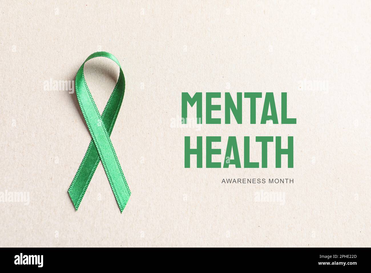 World Mental Health Day. Green ribbon on white background, top view ...