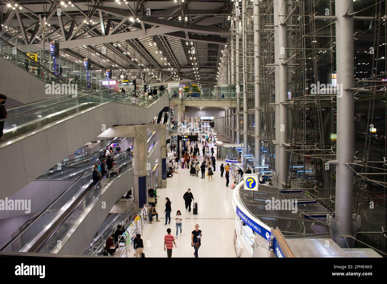 Thai people and foreign travelers passengers walking carry luggage