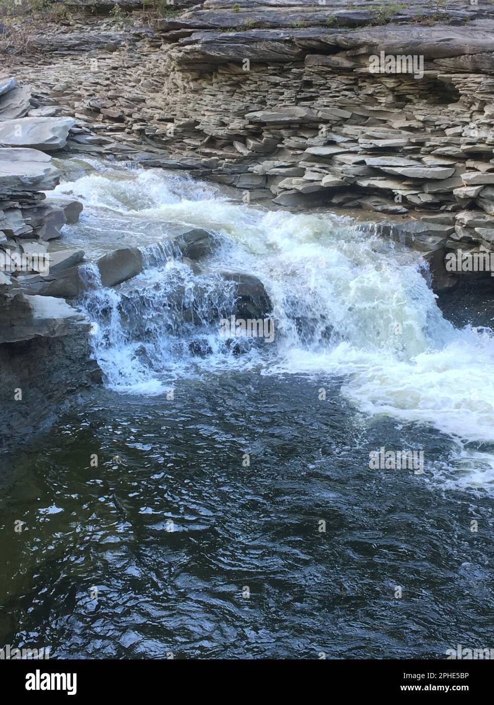 An idyllic landscape of a natural river winding its way through large ...