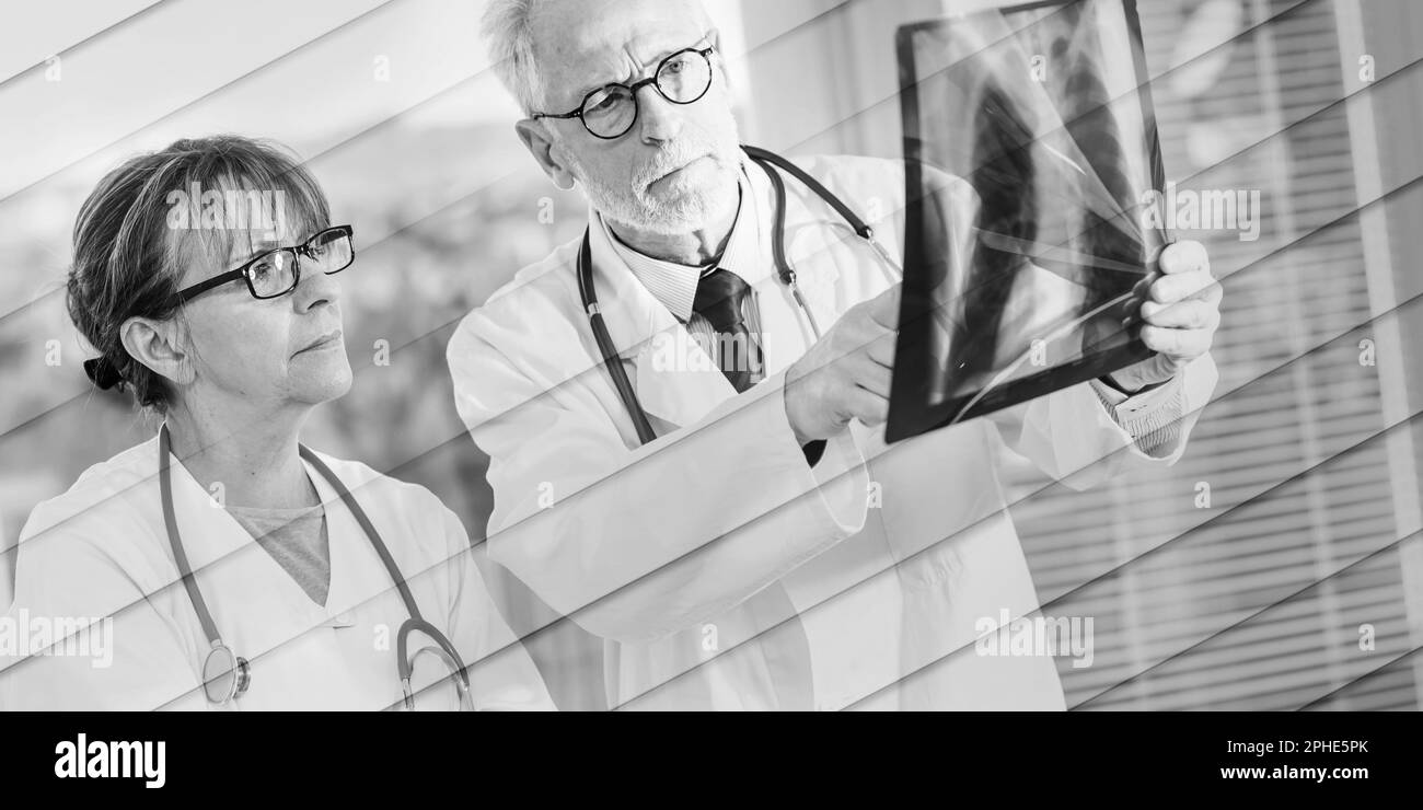 Analyzing x ray report Black and White Stock Photos & Images - Alamy