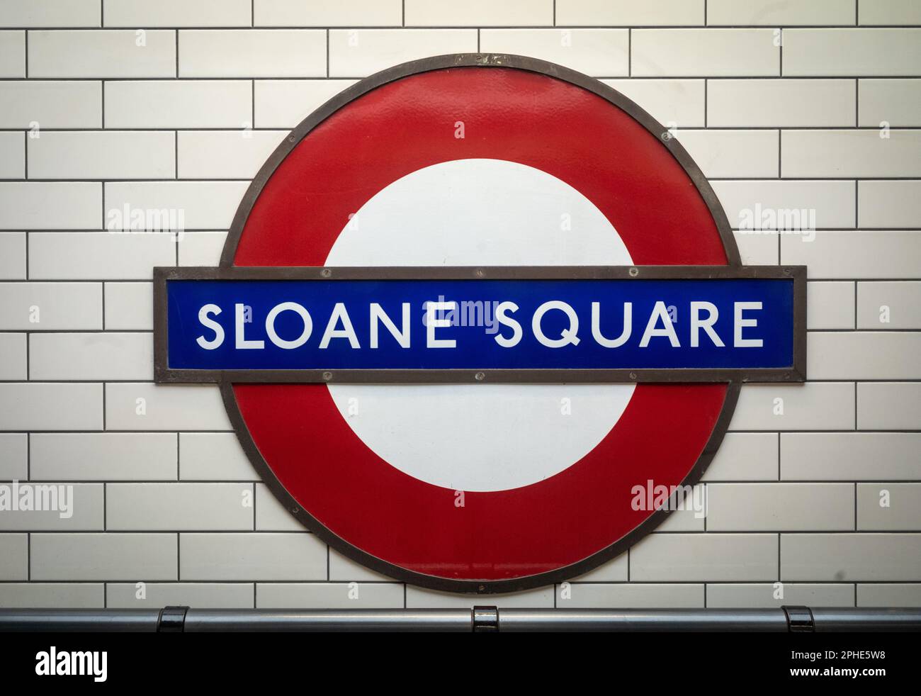 The iconic London Underground station name design for Sloane Square tube station in southwest London. The London Underground roundel, was designed by Stock Photo