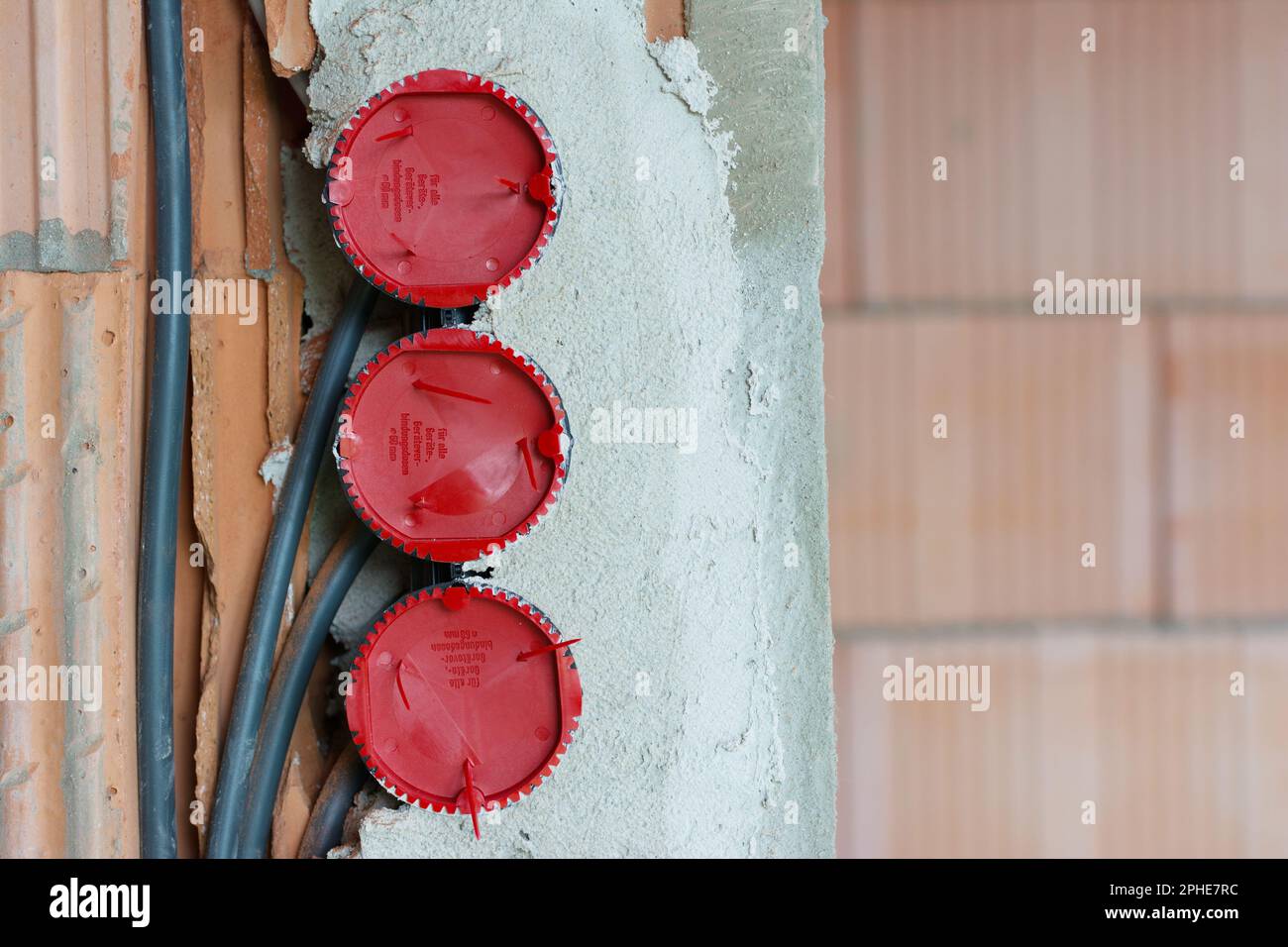 Installation of flush-mounted boxes in a new building Stock Photo