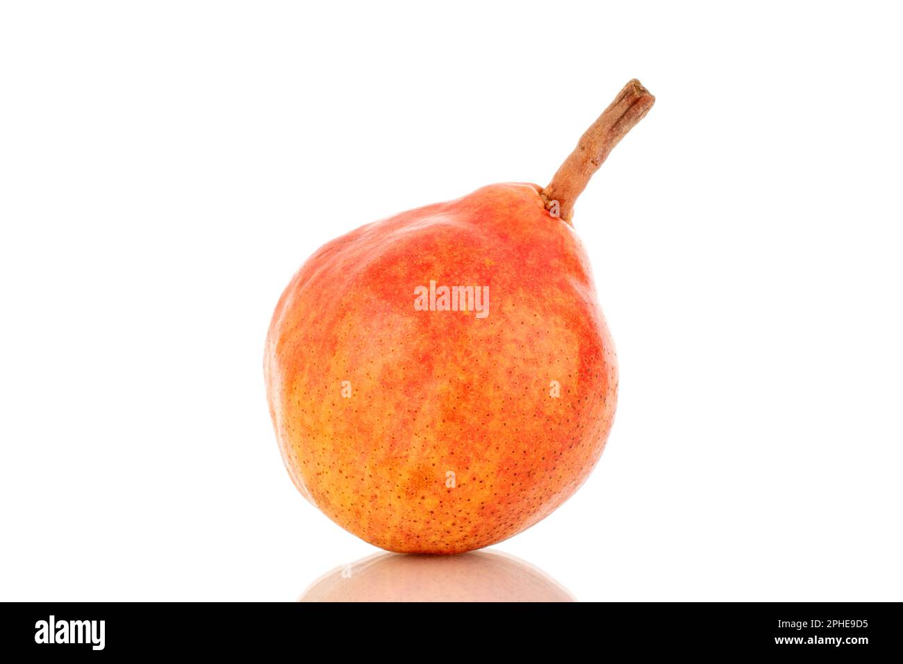One organic Bartlett pear, macro, isolated on white background Stock