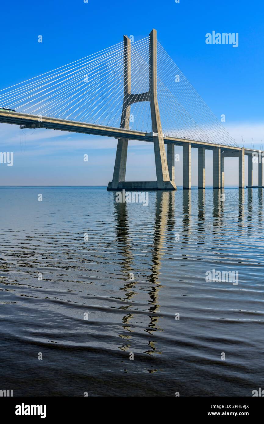 Vasco da Gama Bridge - a cable-stayed bridge with viaducts on either side. Spans the Tagus River in Lisbon. Currently the longest bridge in the EU. Stock Photo