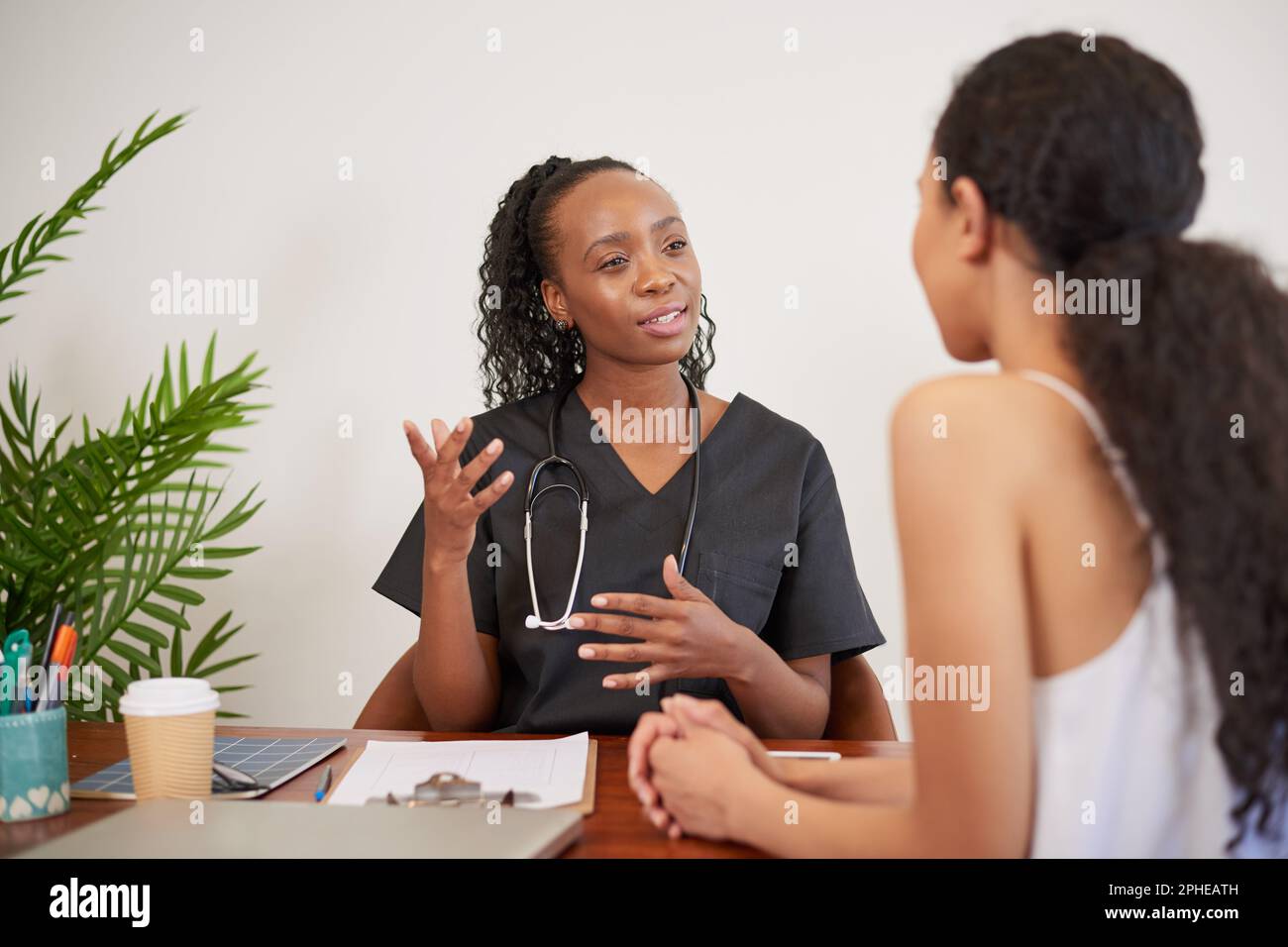 Doctor Patient Consultation Desk Candid Hi Res Stock Photography And