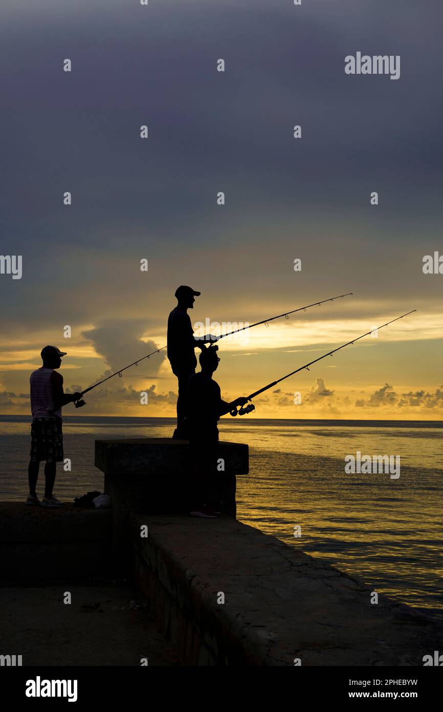 Fishing in the Malecon of Habana, Cuba Stock Photo