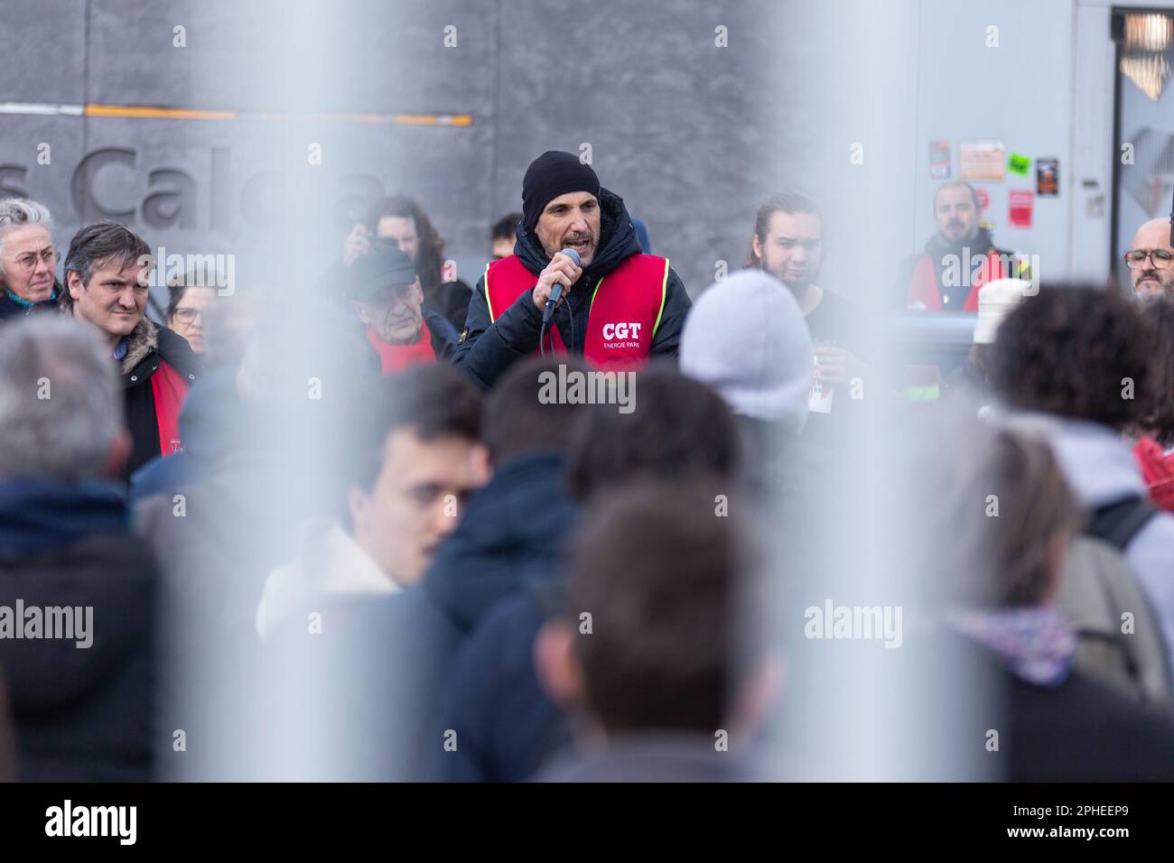 Paris, France. 27th Mar, 2023. A trade unionist seen speaking to a crowd of protesters. Garbage collectors, trade unionists, students, and railway workers blocked the Ivry-sur-Seine garbage incinerator after police tried to end the strike. Since March 6, the waste incineration center (TIRU) in Ivry has been occupied by strikers, garbage collectors, and workers from Suez, a subsidiary of EDF (Electricité de France). (Photo by Telmo Pinto/SOPA Images/Sipa USA) Credit: Sipa USA/Alamy Live News Stock Photo