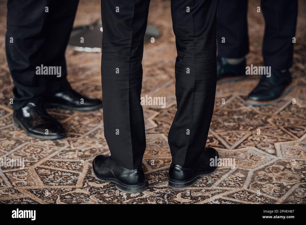 Close up photo of male businessmen in suits talking Stock Photo - Alamy