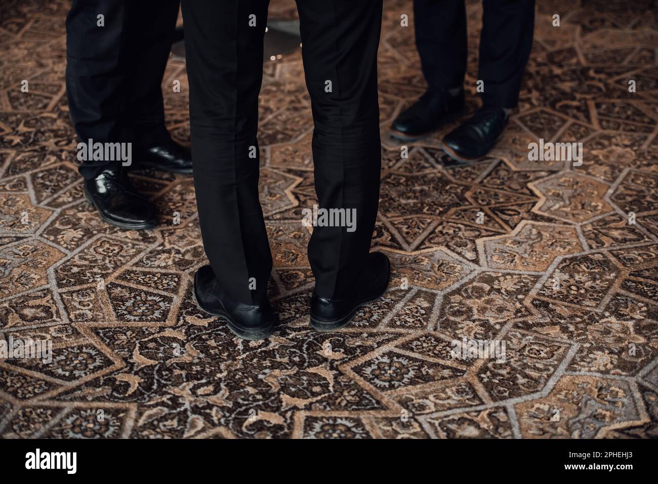 Close up photo of male businessmen in suits talking Stock Photo - Alamy