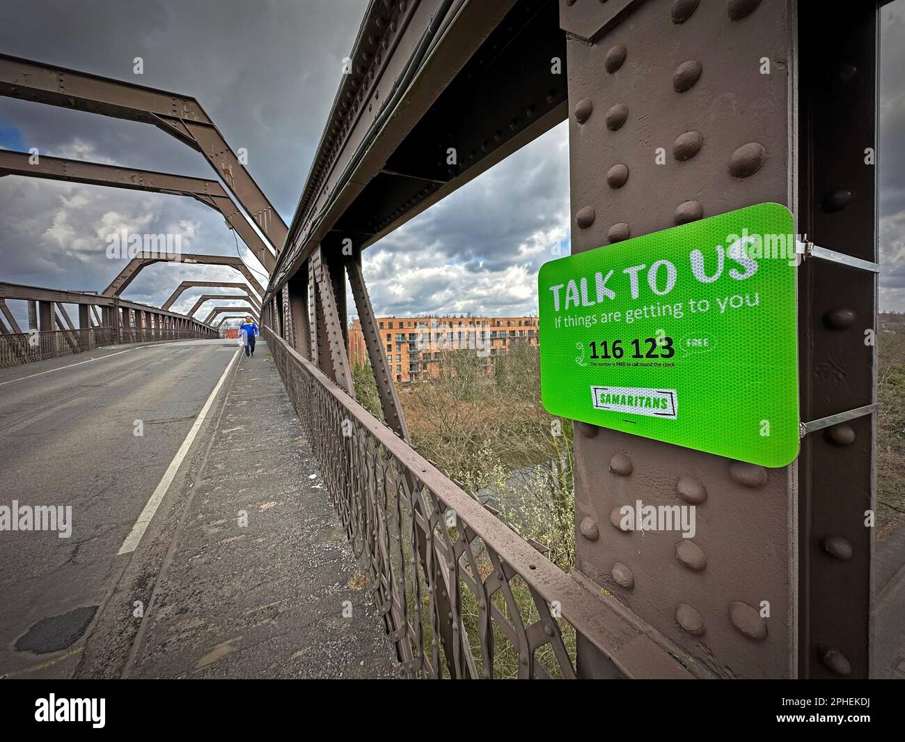 “Talk To Us” Samaritans 116 123 helpline sign on the high-level Cantilever Bridge at Latchford, Warrington, a suicide-prevention measure Stock Photo