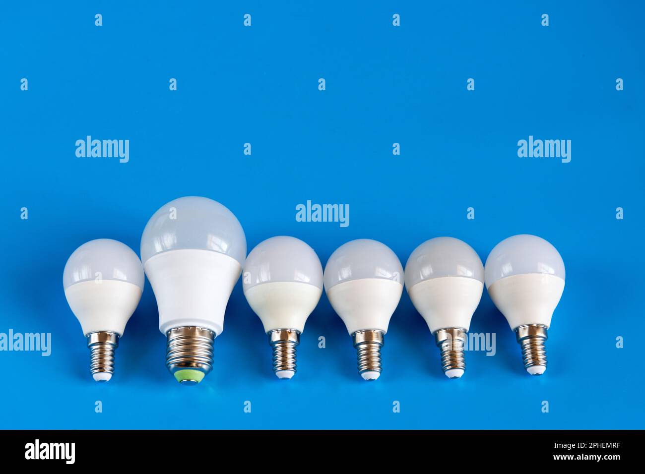 energy-saving LED light bulbs on a blue background Stock Photo